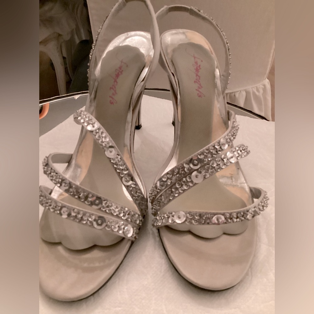 Capparos 8 1/2. Sling back heels